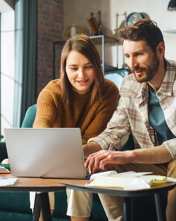 Happy couple meeting financial advisor virtually